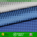 Memory Compound Poly Fabric with Checked Dobby for Garment